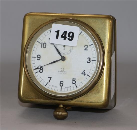 An Omega brass clock height 13cm